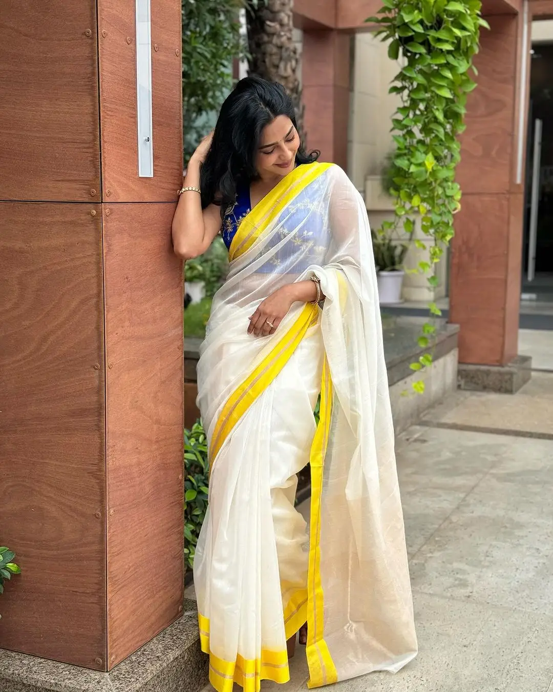 Aishwarya Lekshmi Wearing White Saree Blue Sleeveless Blouse